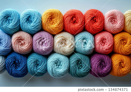 Ready to Create. Colorful yarns for knitting on a white background. Top view. Ready to Create. Colorful yarns for knitting on a white background. Top view. 134874371