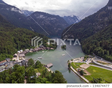 Lake Konigsee, Berchtesgadener land, Bavaria, Germany. Aerial Drone View of a Natural Lake in German Alps at Summer. Lake Konigsee, Berchtesgadener land, Bavaria, Germany. Aerial Drone View of a Natural Lake in German Alps at Summer. 134874477