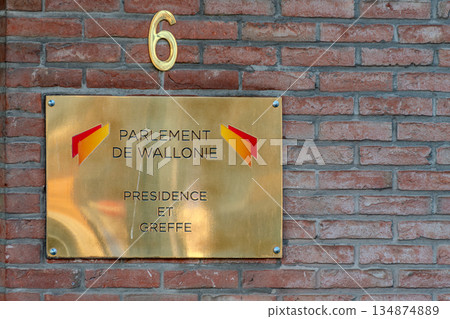 Belgium, Namur, plaque of the Walloon Parliament indicating that it is the seat of the legislative power of the Walloon Region Belgium, Namur, plaque of the Walloon Parliament indicating that it is the seat of the legislative power of the Walloon Region 134874889
