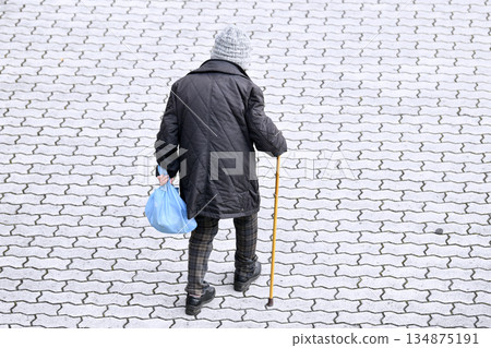 Yokohama cityscape in Japan: Walking sticks are a killer on the sidewalks... Hard-to-see undulations, steps, and unevenness... Elderly people with walking sticks need to be careful... Four-wheeled carts, etc. 134875191