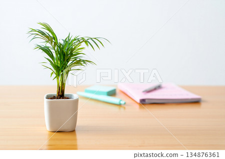 office table with notebooks and notebooks 134876361