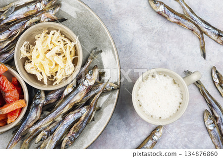 Assorted Dried Fish Snacks on a Plate Assorted Dried Fish Snacks on a Plate 134876860