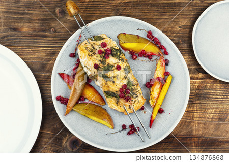 Tasty salmon skewers on wooden surface. Tasty salmon skewers on wooden surface. 134876868