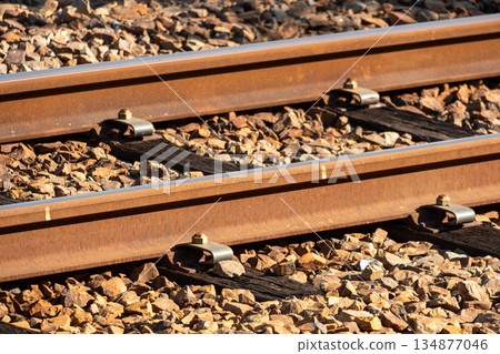 Stone and iron railway rails 134877046