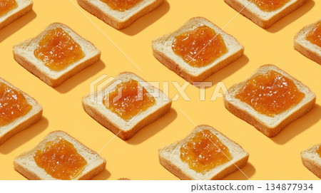 Toast with Orange Marmalade Pattern on Bright Yellow Background Toast with Orange Marmalade Pattern on Bright Yellow Background 134877934