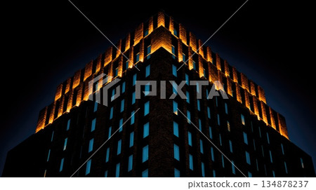 Modern Building with Illuminated Windows at Night Modern Building with Illuminated Windows at Night 134878237