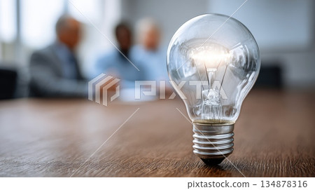 Creative Business Idea Concept with Glowing Light Bulb on Office Desk Creative Business Idea Concept with Glowing Light Bulb on Office Desk 134878316