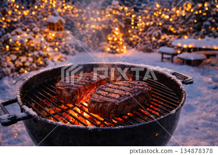 Grilled Beef Steaks on Outdoor Barbecue in Snowy Winter Garden with Festive Lights Grilled Beef Steaks on Outdoor Barbecue in Snowy Winter Garden with Festive Lights 134878378