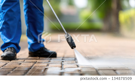 Pressure Washing Pavement with High Power Water Jet Cleaning System Pressure Washing Pavement with High Power Water Jet Cleaning System 134878509