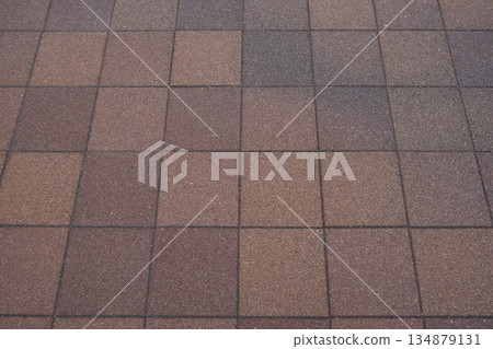 Reddish-brown paving tiles Reddish-brown paving tiles 134879131