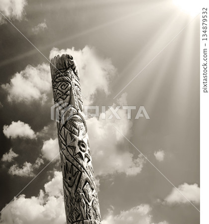 Old wooden idol in the field Old wooden idol in the field 134879532