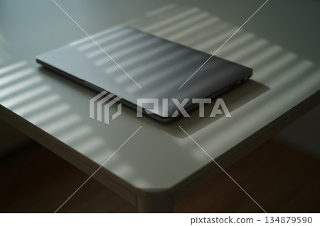 black tablet on a desk 134879590