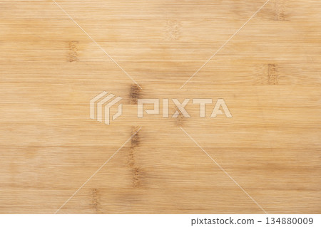 Close up photo texture of a bamboo cutting board, natural wood texture 134880009