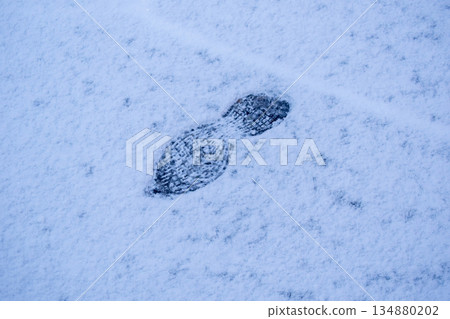 Footprints remaining in the snow Footprints remaining in the snow 134880202