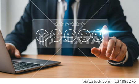 Customer satisfaction feedback concept with five star rating and happy face icon on digital interface 134880270