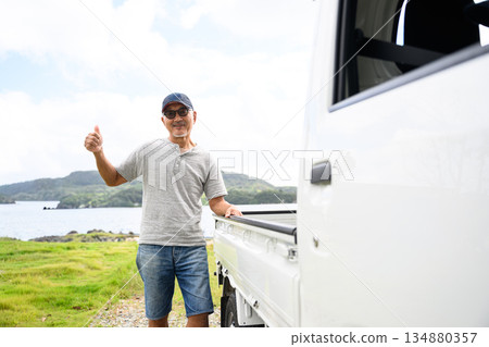 An elderly man traveling in a light truck (Photo courtesy of Oki Seaside Resort Miyabi) An elderly man traveling in a light truck (Photo courtesy of Oki Seaside Resort Miyabi) 134880357