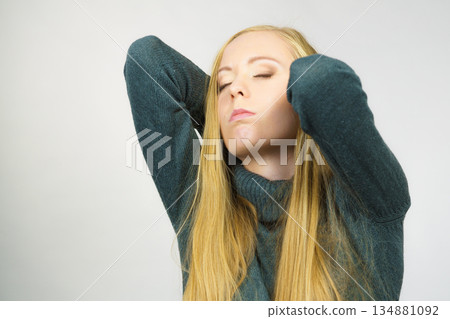 Sad confused young female 134881092