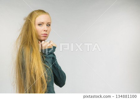 Sad confused young female Sad confused young female 134881100