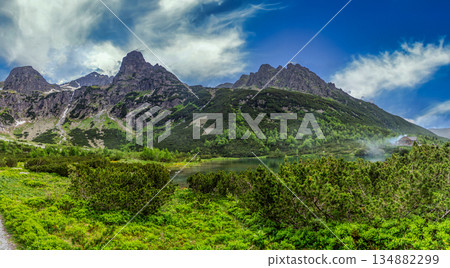 Majestic peaks reflected in Green Lake in High Tatras Majestic peaks reflected in Green Lake in High Tatras 134882299