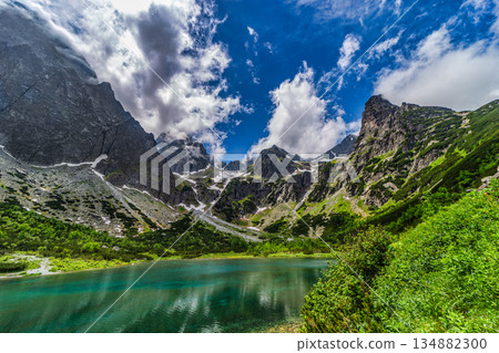 Majestic peaks reflected in Green Lake in High Tatras Majestic peaks reflected in Green Lake in High Tatras 134882300