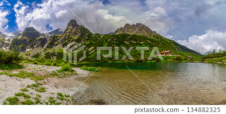 Panoramic view of Green Lake and mountain hut in High Tatras Panoramic view of Green Lake and mountain hut in High Tatras 134882325