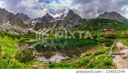 Dark storm clouds over alpine lake Zelene pleso in High Tatras 134882344