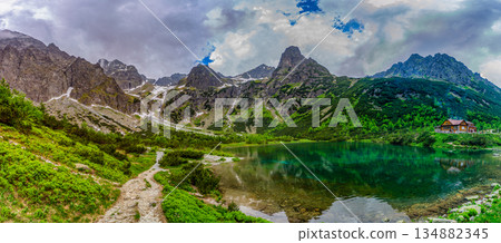 Dark storm clouds over alpine lake Zelene pleso in High Tatras 134882345