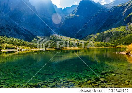 Deep emerald waters of Zelene pleso lake in High Tatras, Slovakia Deep emerald waters of Zelene pleso lake in High Tatras, Slovakia 134882432