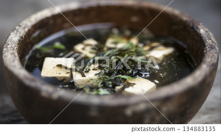 Traditional Asian Seaweed and Tofu Soup in a Hand-Carved Wooden Bowl 134883135