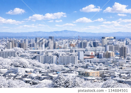 Snowy scenery overlooking the Yamagata Shinkansen and the cityscape towards JR Utsunomiya Station from Utsunomiya Tower Snowy scenery overlooking the Yamagata Shinkansen and the cityscape towards JR Utsunomiya Station from Utsunomiya Tower 134884501