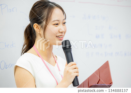 business woman giving a presentation 134888137
