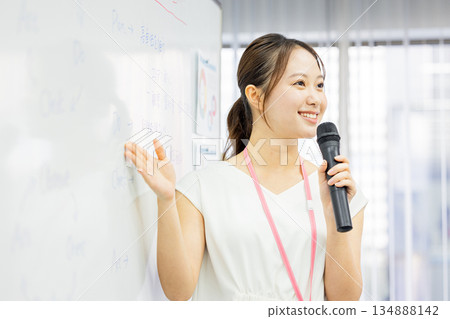 business woman giving a presentation business woman giving a presentation 134888142