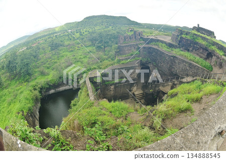Top view of Daulatabad Fort is an ancient fort located in Maharashtra, India. Originally named Deogiri,fort built from natural rocks and is very strong. it is a fort built from natural rocks. Top view of Daulatabad Fort is an ancient fort located in Maharashtra, India. Originally named Deogiri,fort built from natural rocks and is very strong. it is a fort built from natural rocks. 134888545