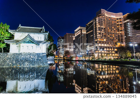 Tokyo: The illuminated Tatsumi Tower of the Imperial Palace and Marunouchi 134889045
