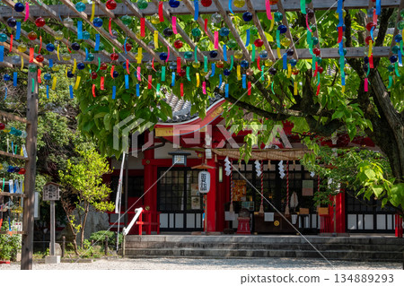 Shrine and colorful wind chimes Shrine and colorful wind chimes 134889293