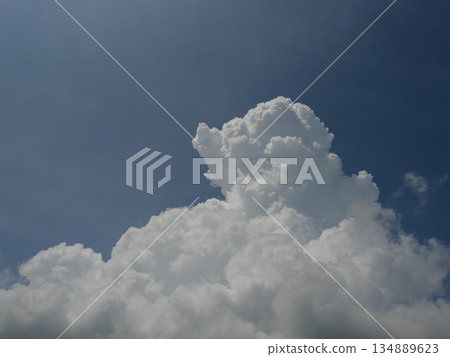 Cumulus cloud on beautiful blue sky in day light , Fluffy clouds formations at tropical zone Cumulus cloud on beautiful blue sky in day light , Fluffy clouds formations at tropical zone 134889623