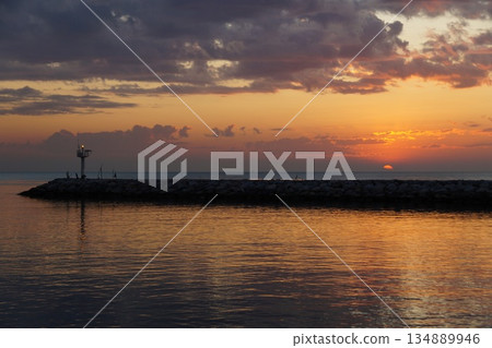 The dawn is breaking over the horizon. 134889946