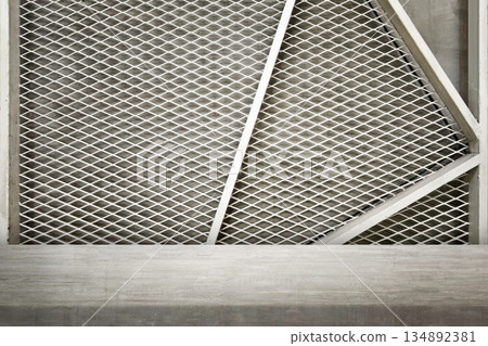 Concrete Table with White Expanded Metal Mesh and Concrete Background. Concrete Table with White Expanded Metal Mesh and Concrete Background. 134892381
