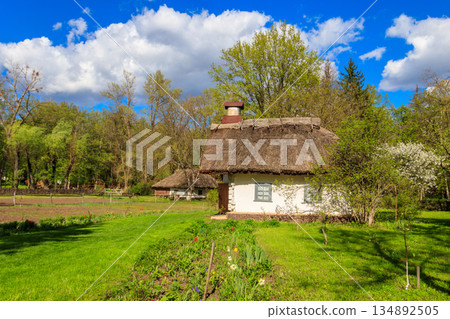 Ancient traditional ukrainian rural house in Open air Museum of Folk Architecture and Folkways of Middle Naddnipryanschina in Pereyaslav, Ukraine Ancient traditional ukrainian rural house in Open air Museum of Folk Architecture and Folkways of Middle Naddnipryanschina in Pereyaslav, Ukraine 134892505