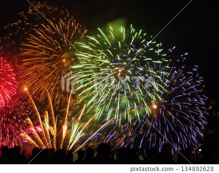Colorful fireworks that explode in arcs Colorful fireworks that explode in arcs 134892628