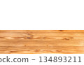 A top-down view of a wooden table or tabletop, separated from a white background. 134893211