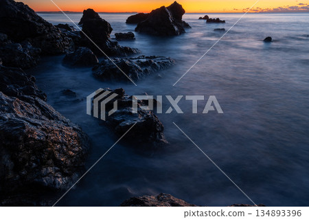 Sunrise and crashing waves Sunrise and crashing waves 134893396