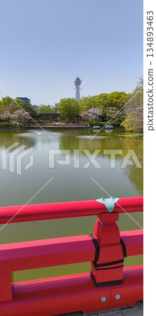 Tsutenkaku Tower seen from Wake Bridge over the riverbed pond of Chausuyama Tsutenkaku Tower seen from Wake Bridge over the riverbed pond of Chausuyama 134893463