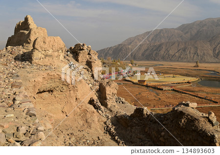 The Tashkurgan Stone City was a small fortified city with multiple layers of walls. Today, some of the walls have collapsed, leaving behind a unique sight of piles of stones and ruins.  134893603
