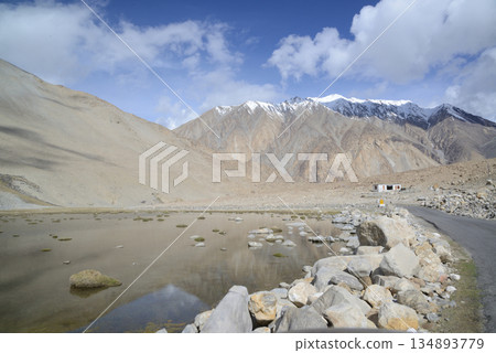 Changla Pass, one of the highest motorable roads in the world, at 5,275 meters above sea level, travels between Leh Ladakh and Pangong Lake. Located at Leh in India. 134893779