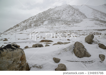 Changla Pass, one of the highest motorable roads in the world, at 5,275 meters above sea level, travels between Leh Ladakh and Pangong Lake. Located at Leh in India. 134893786
