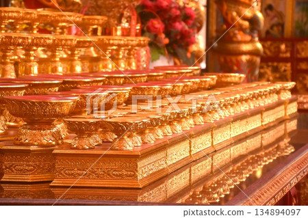golden pan for offering Buddha arranging in Na Tcha Sa Tai Chi Shrine Chinese temple travellocation on Thailand 134894097