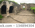 Classic arched entrance at Daulatabad Fort is an ancient fort located in Maharashtra, India. Originally named Deogiri, it is a fort built from natural rocks and is very strong. 134894304