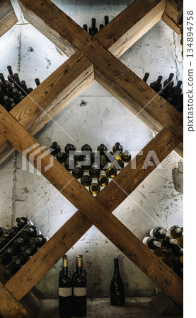 Modern Wine Cellar Display with Wooden Grid and Backlighting 134894758