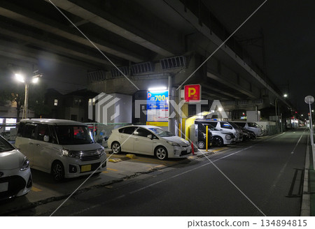 Parking lot/Night coin parking Parking lot/Night coin parking 134894815